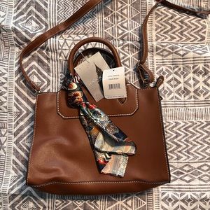 London Fog purse. Brand new with tags. Brown